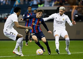 Real Madrid's defender Eder Militao (L) and midfielder Fede Valverde (R) in action against FC Barcelona's midfielder Gavi (C) during the Spanish SuperCup final soccer match between Real Madrid and FC barcelona held at King Fahd Stadium in Riyadh, Saudi Arabia, 15 January 2023. Efe/ABACAPRESS.COM// Juan Carlos Cardenas - Photo by Icon sport