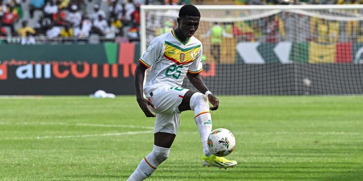 Senegal's midfielder #25 Lamine Camara controls the ball during the Africa Cup of Nations (CAN) 2024 group C football match between Senegal and Gambia at Stade Charles Konan Banny in Yamoussoukro on January 15, 2024. (Photo by Issouf SANOGO / AFP)