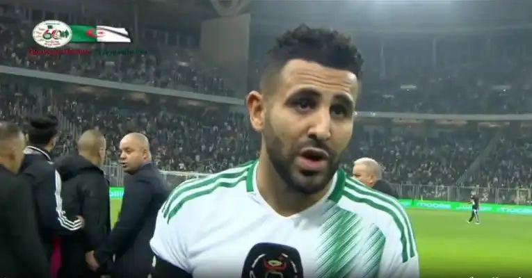 شاهد مالذي قاله رياض محرز بعد مبارة الذهاب ضد النيجر،  تكلم عن الفوز الصعب المحقق و كذا قدوم اللاعبين الجدد و شعوره باللعب في الملعب الجديد ببراقي